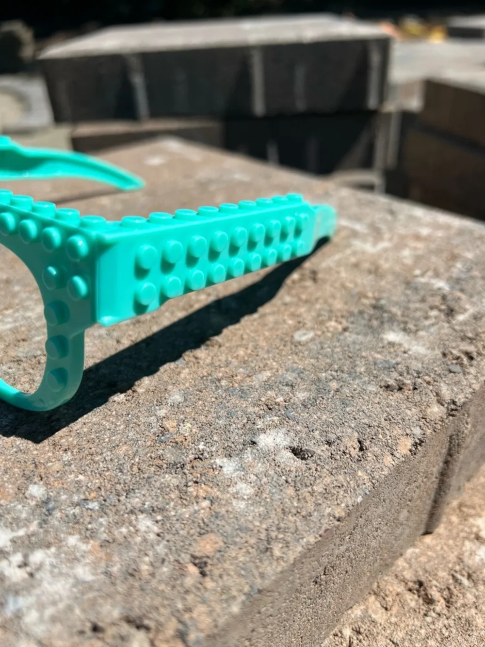 collectible teal LEGO-themed glasses 🤓